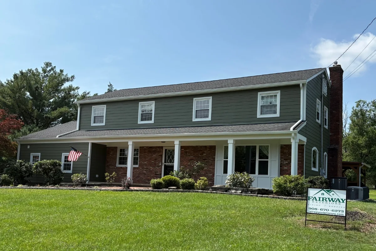 Sage green James Hardie fiber cement siding on a Belle Mead, NJ center-hall colonial