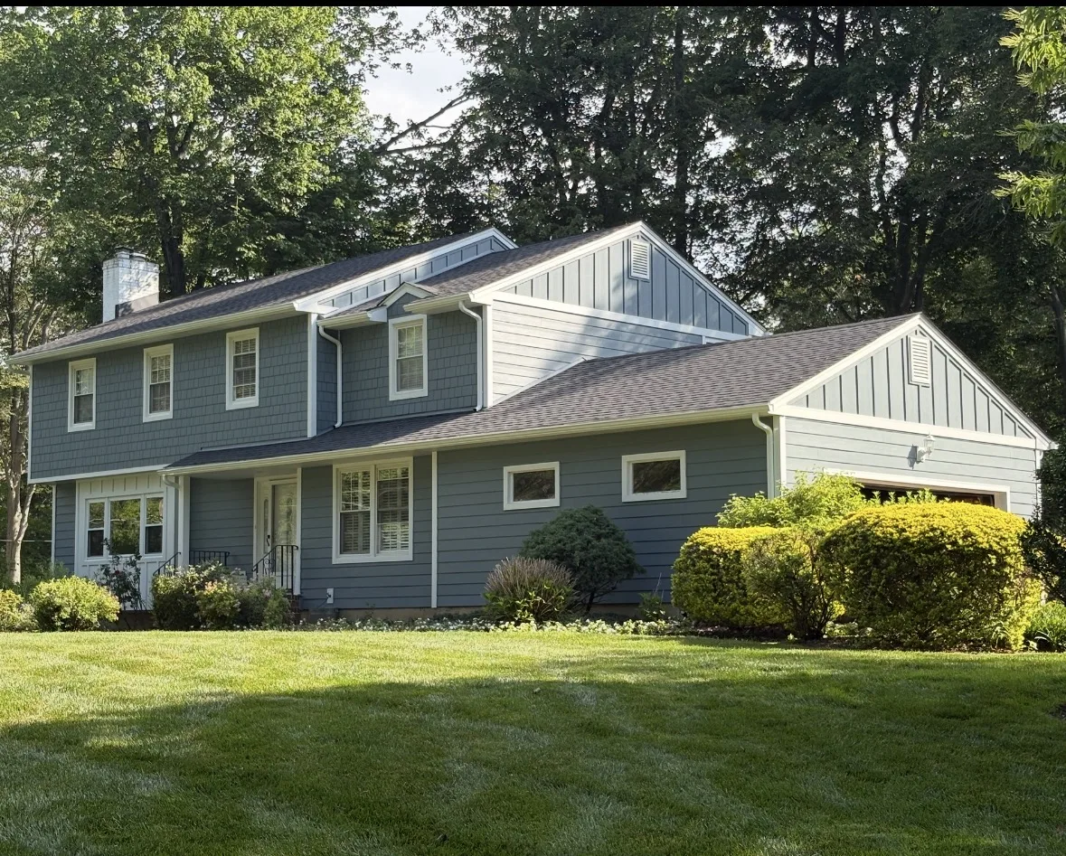 James Hardie siding and board-and-batten on the garage wing of a Freehold, NJ colonial