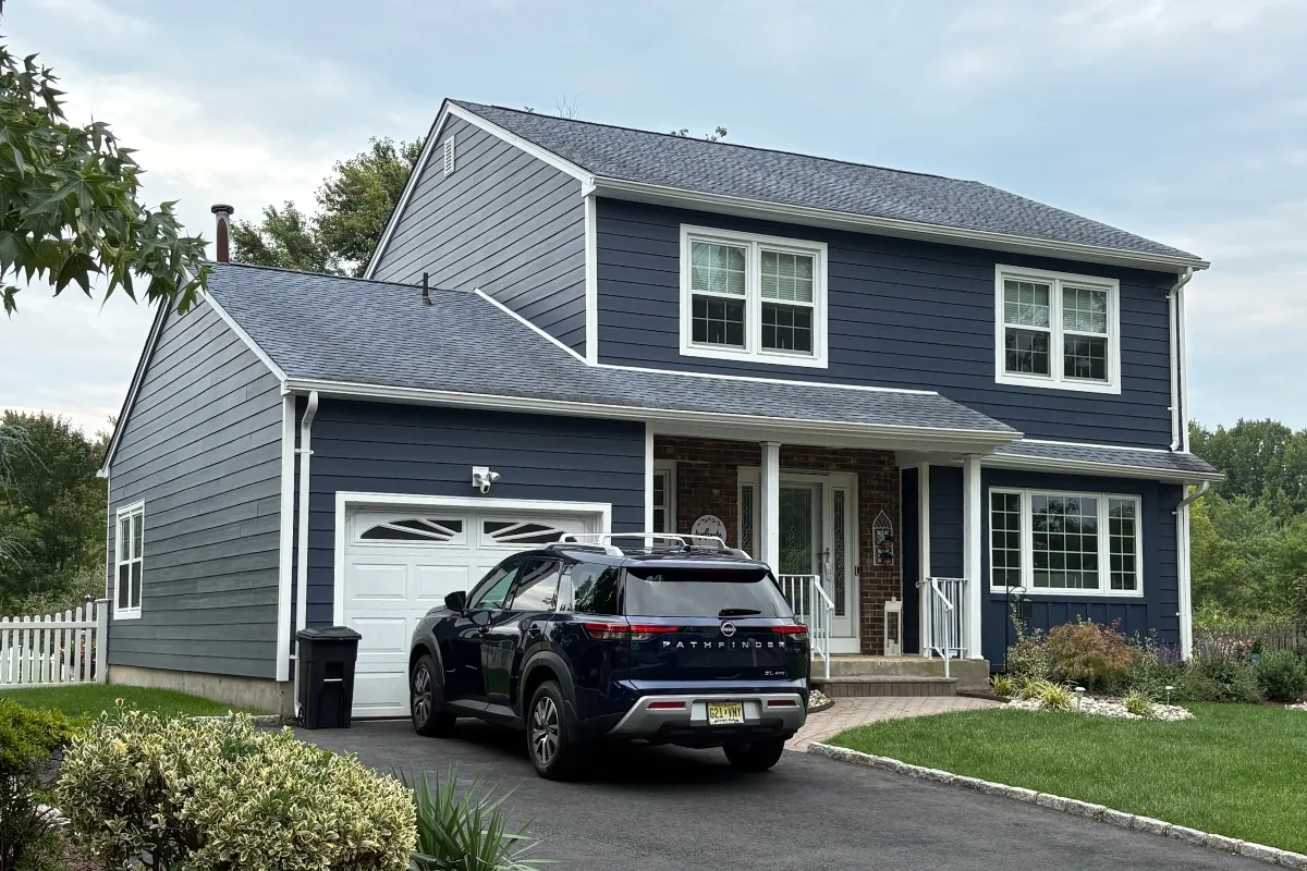 James Hardie siding on the garage wing and side gable of a South Brunswick, NJ home