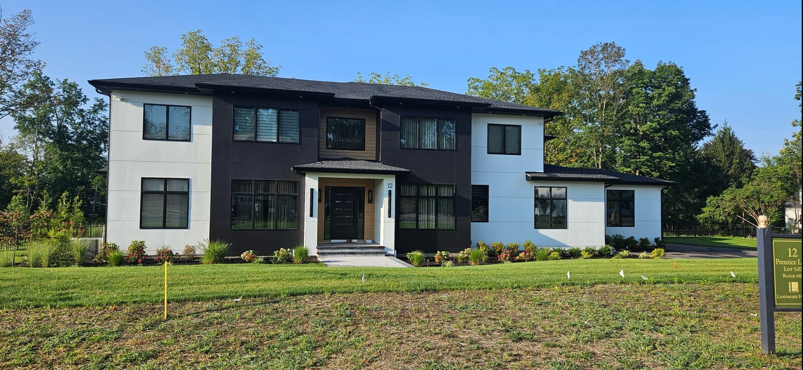 Modern farmhouse with new roofing and James Hardie siding completed by Fairway Exteriors in Princeton, NJ